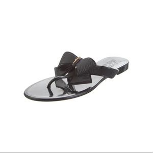 Salvatore Ferragamo rubber bow flip flops!